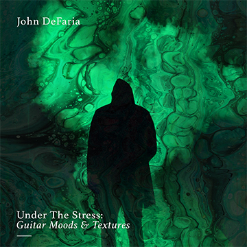 A black silhouette of a man standing in front of a green marble effect background